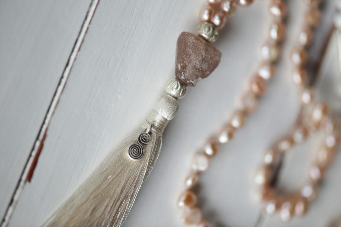 Prayer Beads Necklace in Close Up Photography